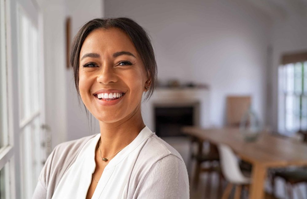 Portrait,Of,A,Beautiful,African,Woman,Smiling,While,Looking,At Portrait,Of,A,Beautiful,African,Woman,Smiling,While,Looking,At