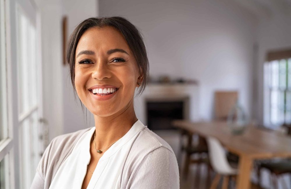 Portrait,Of,A,Beautiful,African,Woman,Smiling,While,Looking,At