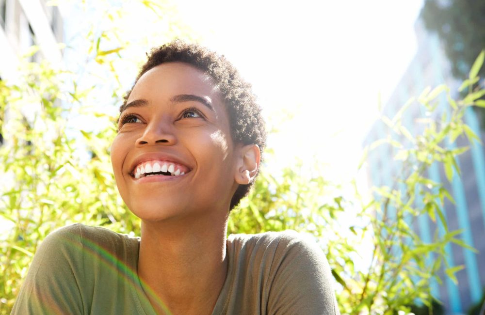Close,Up,Portrait,Of,Beautiful,Young,Black,Woman,Smiling,Outdoors Close,Up,Portrait,Of,Beautiful,Young,Black,Woman,Smiling,Outdoors