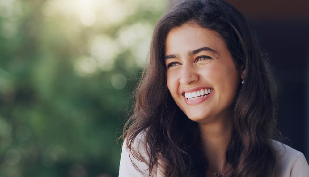Woman smiling at the dentist getting a Dental exam in Oklahoma City. Dentist in Oklahoma City